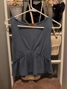Soho Blue Peplum Sleeveless Knit Top